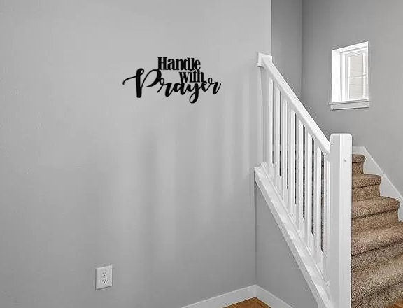 Handle with Prayer Metal Sign